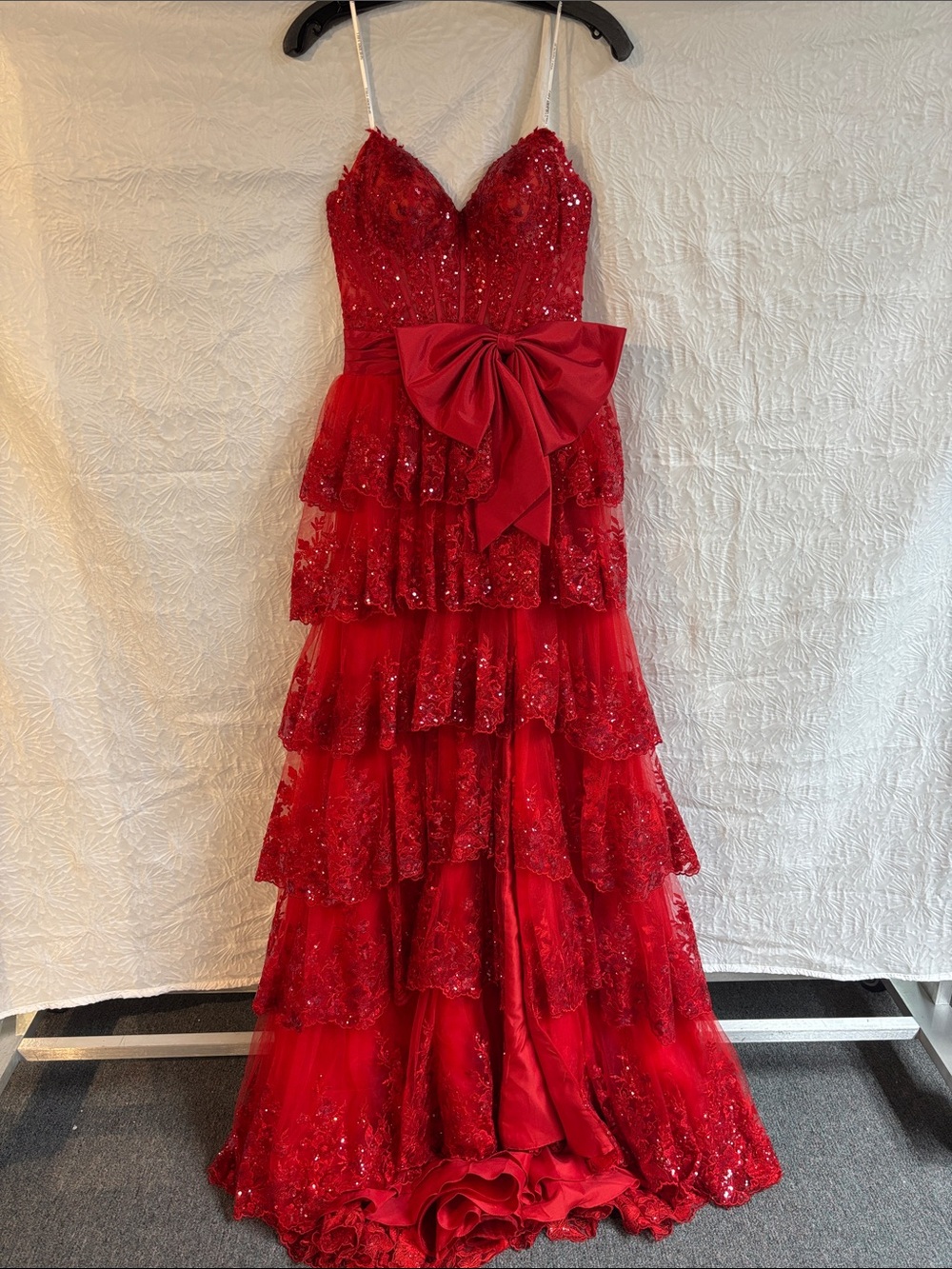 Sherri Hill 56584 Red Tiered Sequin Gown with Statement Bow
